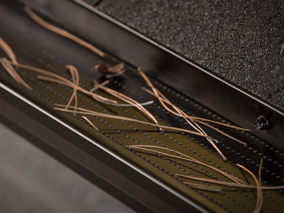 DoublePro® protection on a pine-covered eave — Flow-Pro Eavestroughing, Whitemouth MB